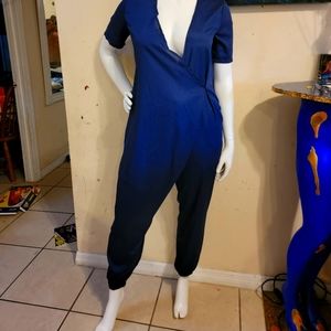 jumpsuit dark blue, with a smell.100% polyester.  size xl, 50$